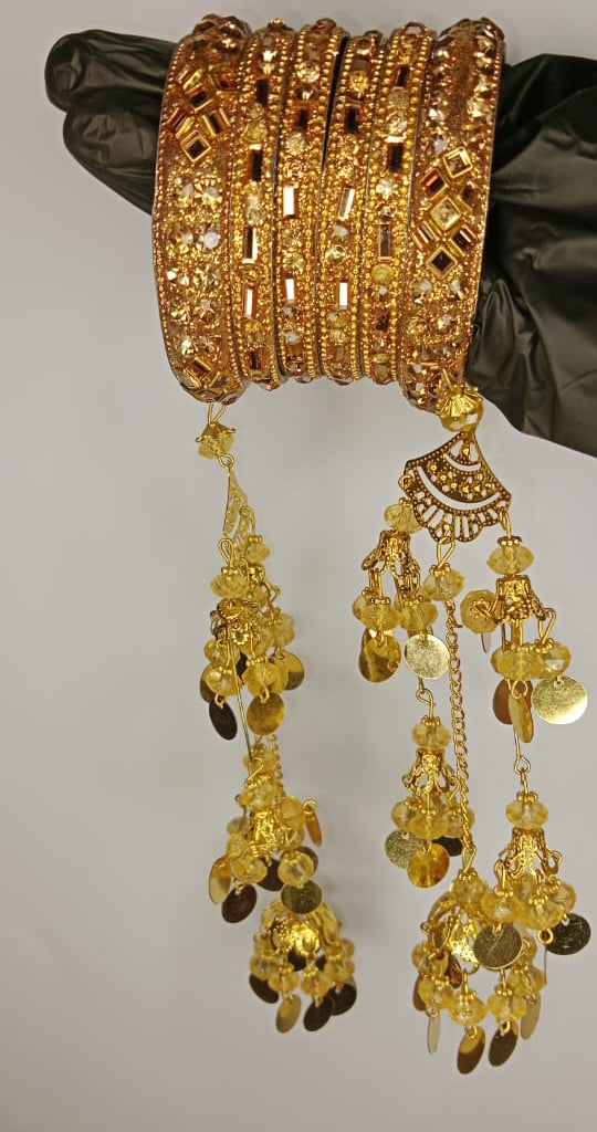 Bridal Golden Bangles Set With Intricate Stonework And Traditional Hanging Kaleere