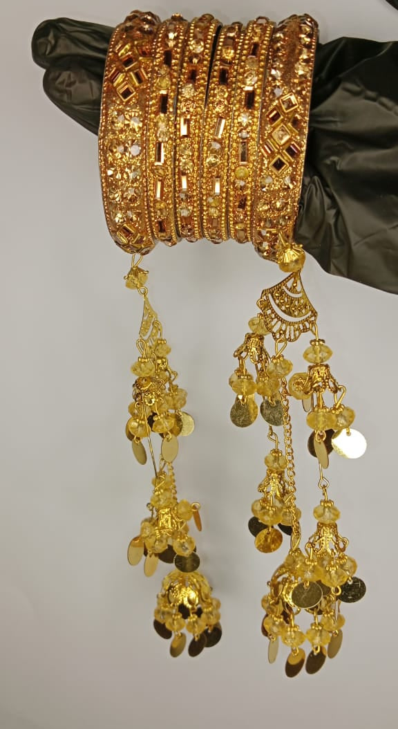 Bridal Golden Bangles Set With Intricate Stonework And Traditional Hanging Kaleere